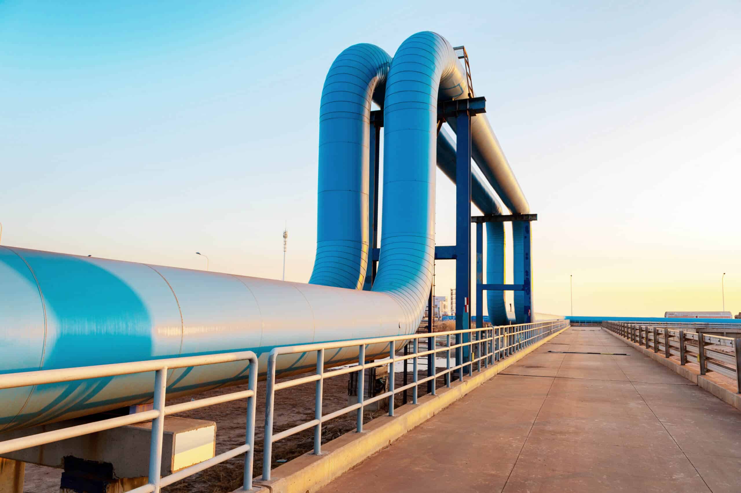 Blue pipes going to oil refinery