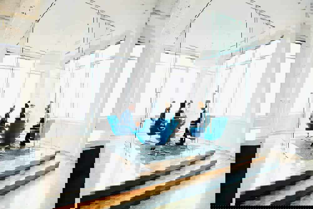 Businesspeople discussing project in office