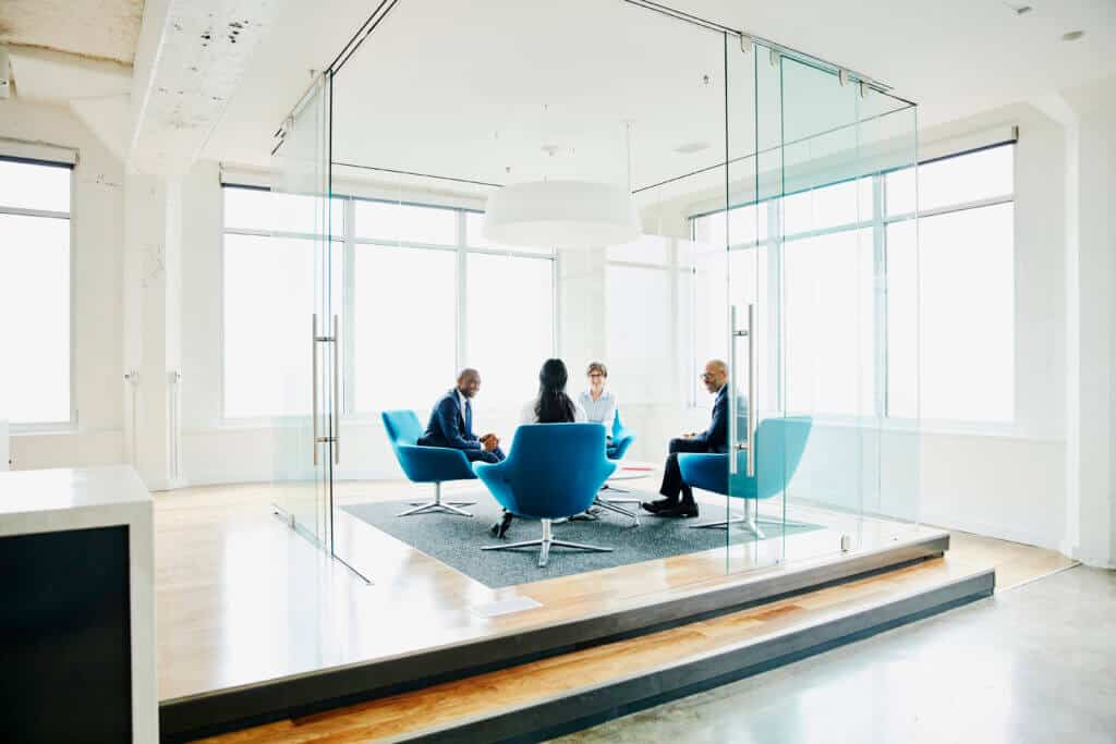 Businesspeople discussing project in office 2024 Pros to Know Award