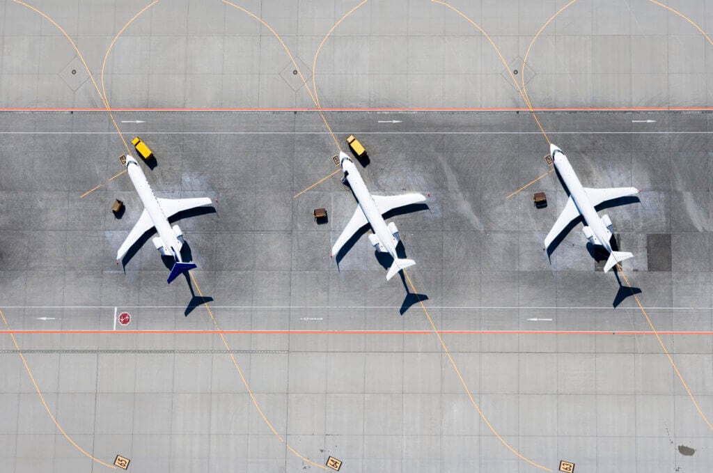 Aerial view of three airplanes in a row Aerial view of three airplanes in a row