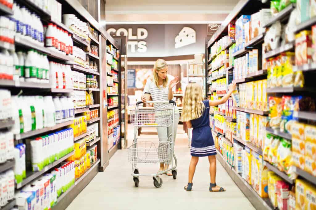 Mother and daughter in grocery store Food and Beverage Industry