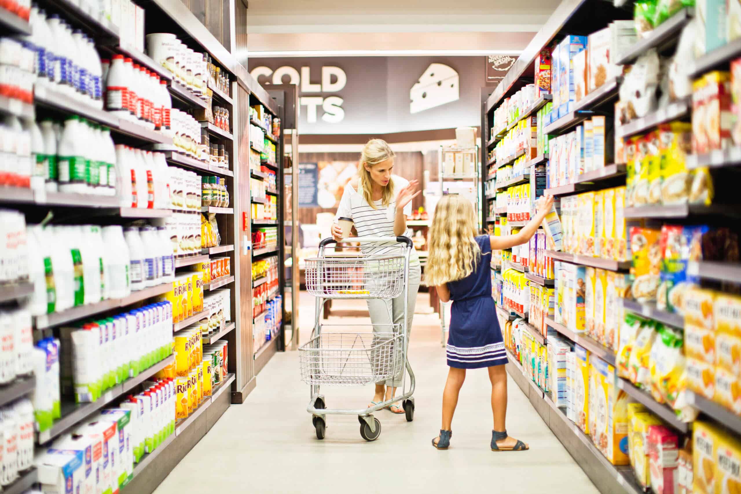 Mother and daughter in grocery store