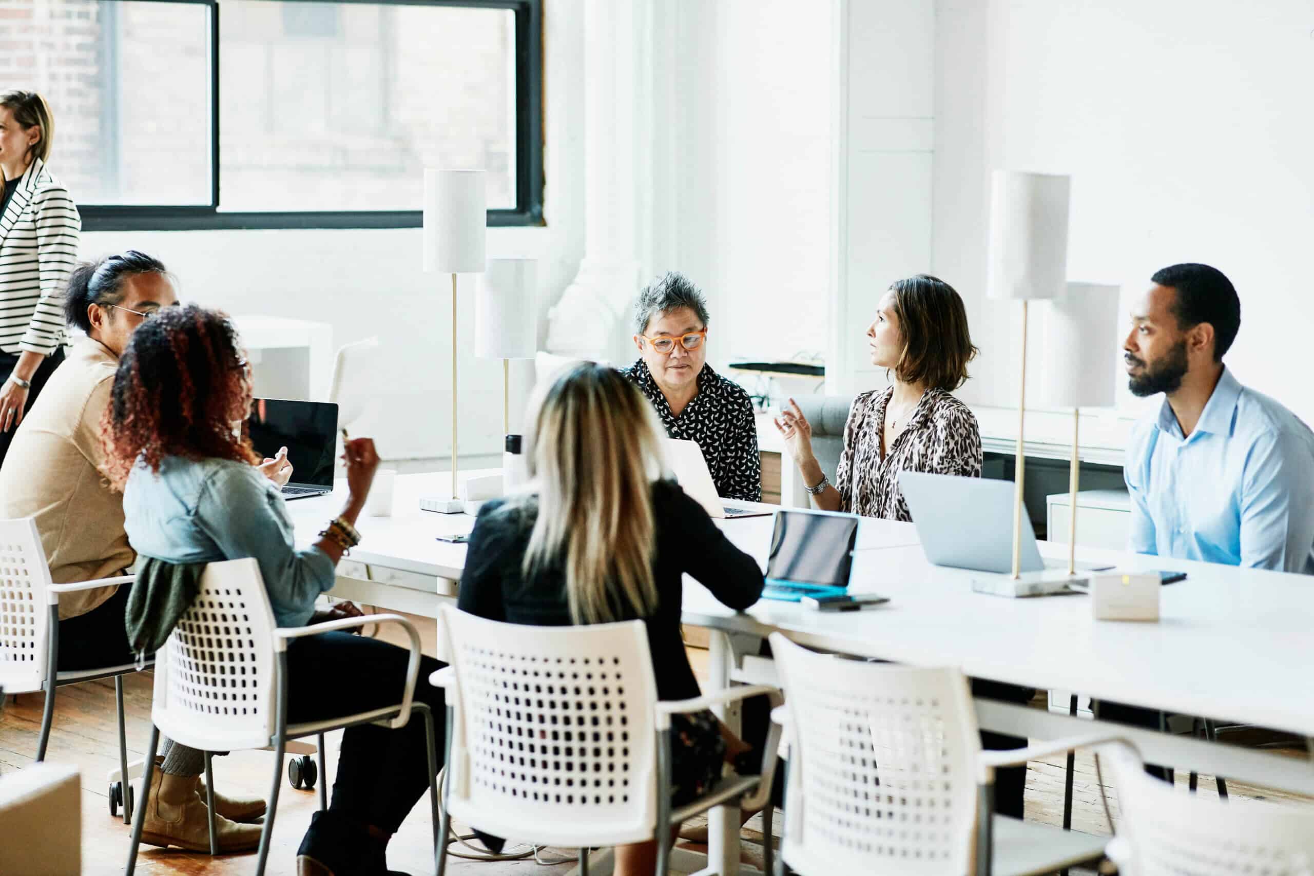 Businesspeople working in coworking office