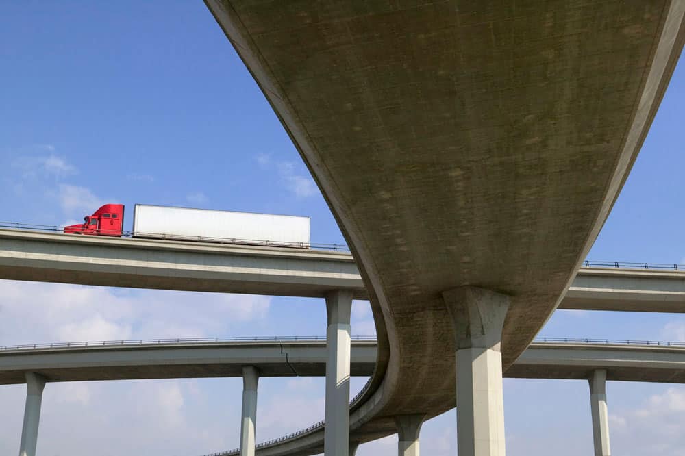 Kenworth truck on a freeway overpass near Pomona, California USA