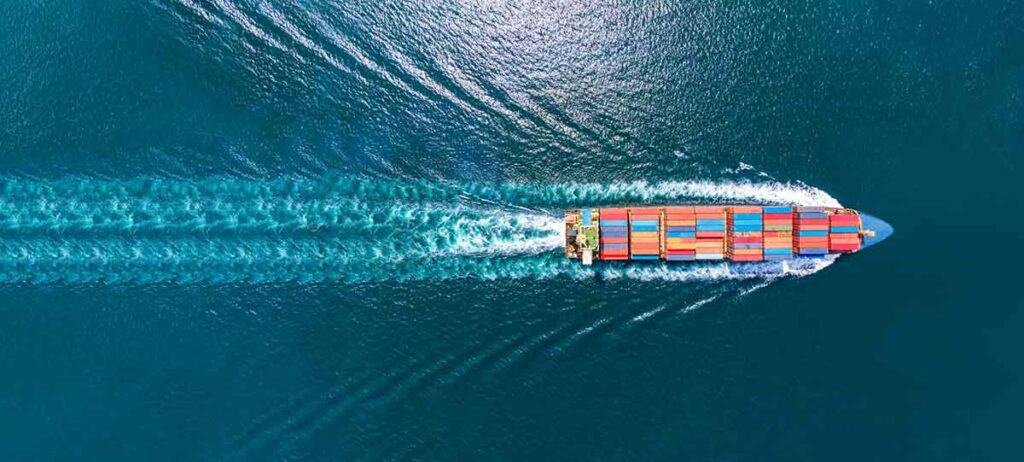 GettyImages-1286676121-72dpi Aerial View Of Container Ship In Sea