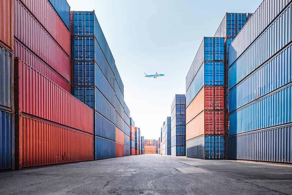 Container Cargo Port Ship Yard Storage Handling of Logistic Transportation Industry. Row of Stacking Containers of Freight Import/Export Distribution Warehouse. Shipping Logistics Transport Industrial