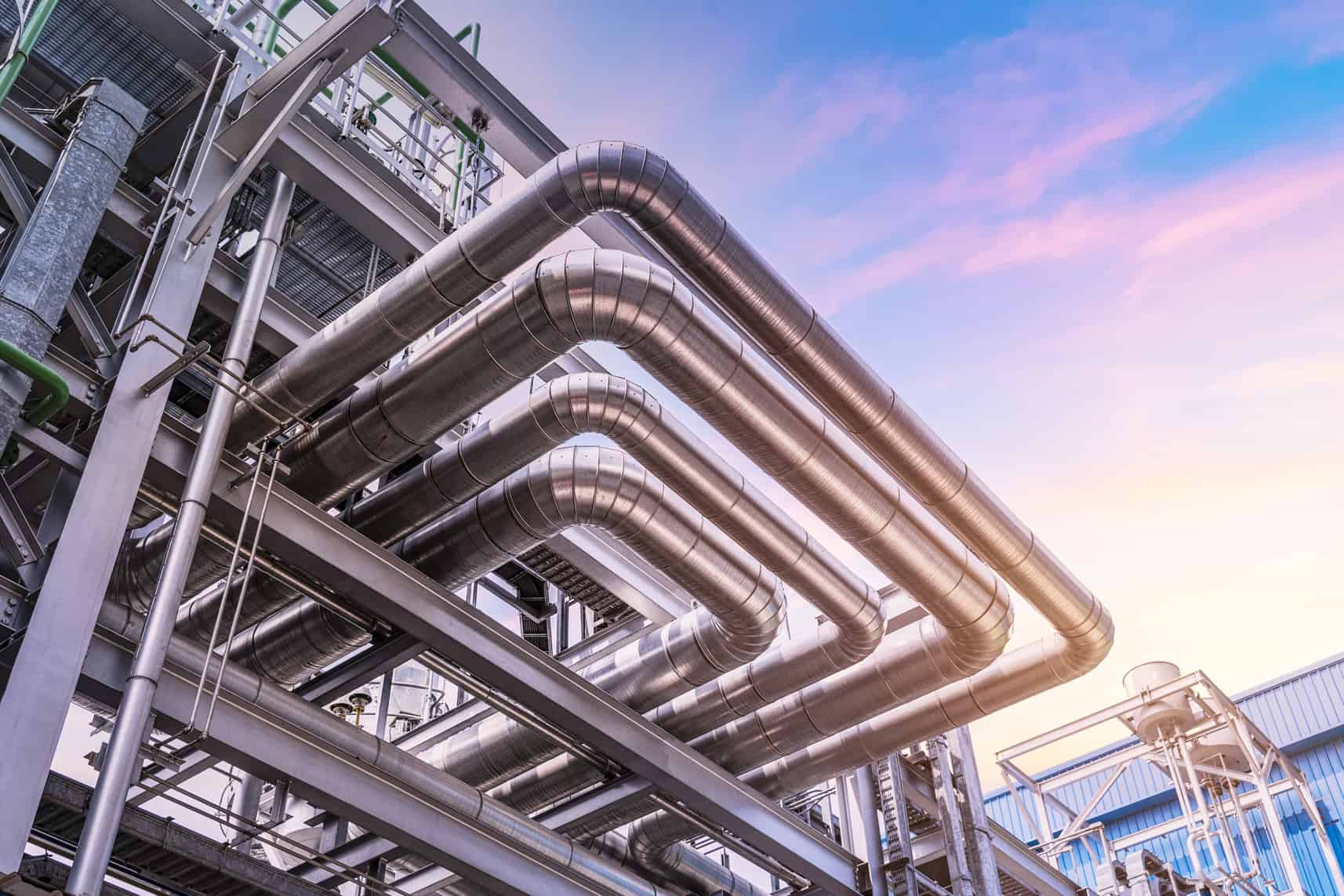 pipeline of oil and gas at industry zone.The pipe of factory ,Close-up of industrial steel pipelines at oil-refinery plant and sky