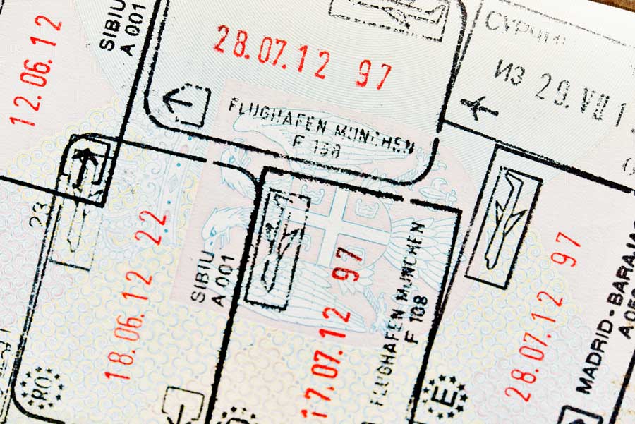 Customs stamp in passport, close up shot.