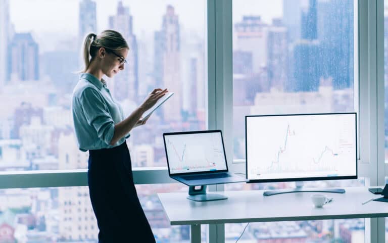 Businesswoman With Tablet Working In Office