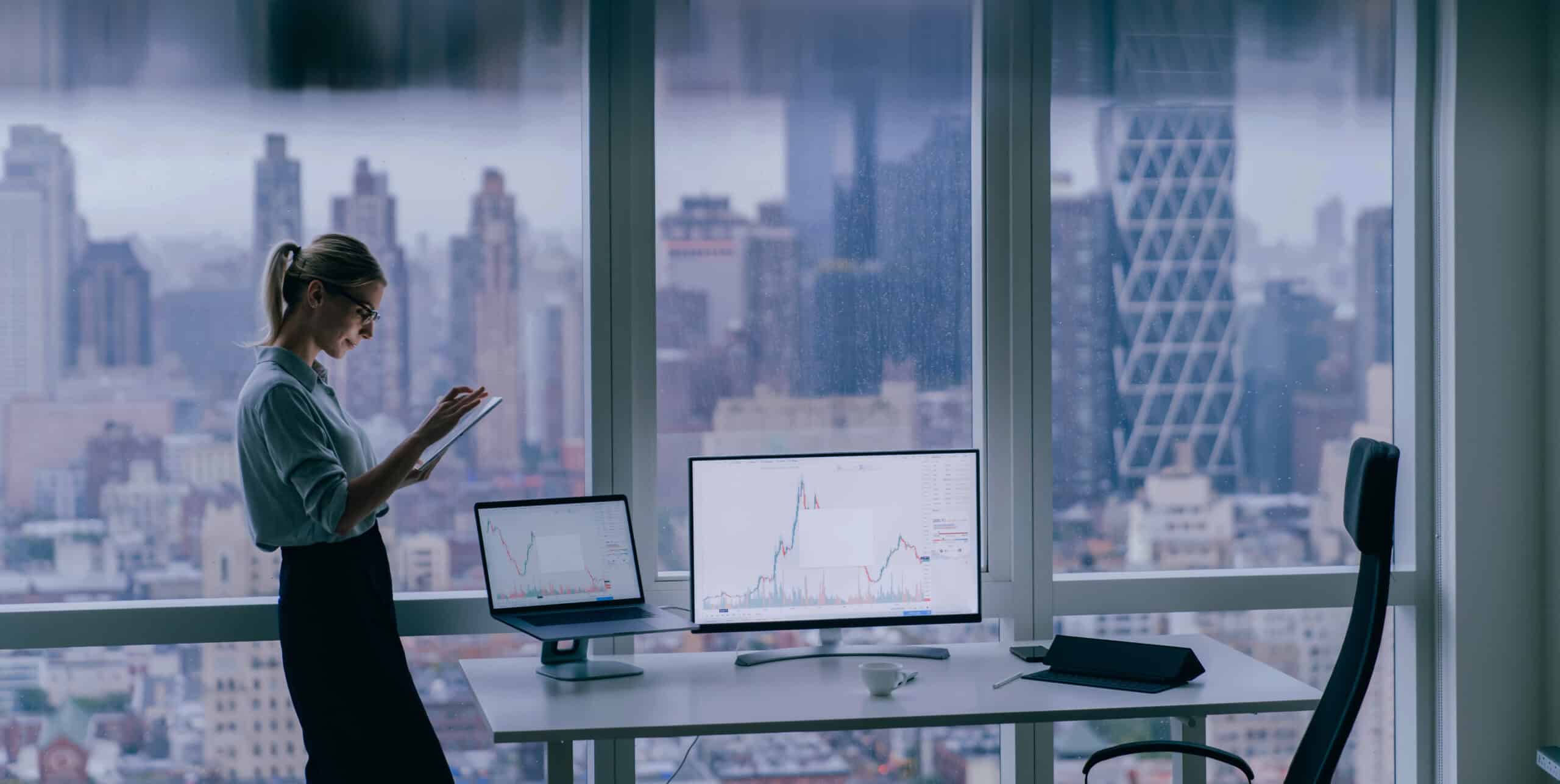 Businesswoman With Tablet Working In Office Cropped2